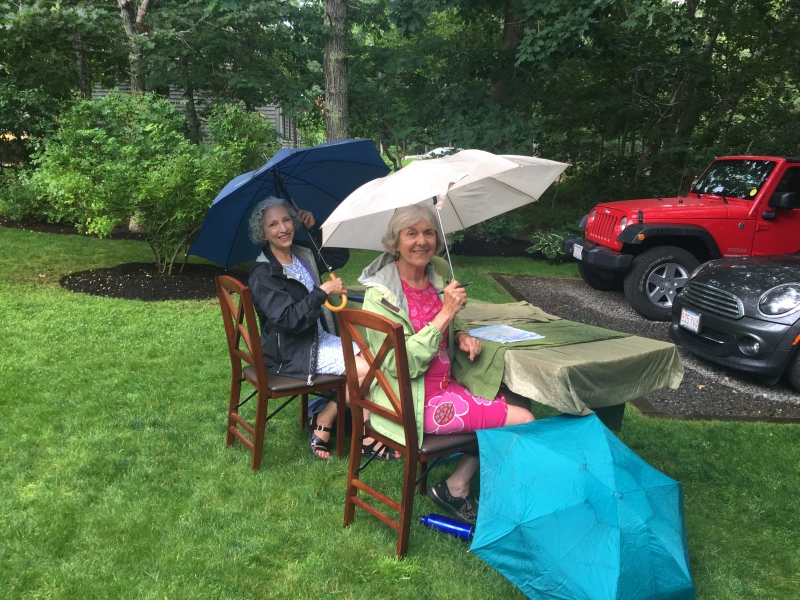 Happy Volunteers in the rain